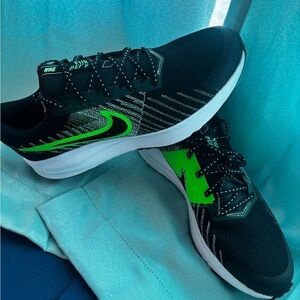 Seahawks fan ready! Nike Black and Neon Green Running Shoes